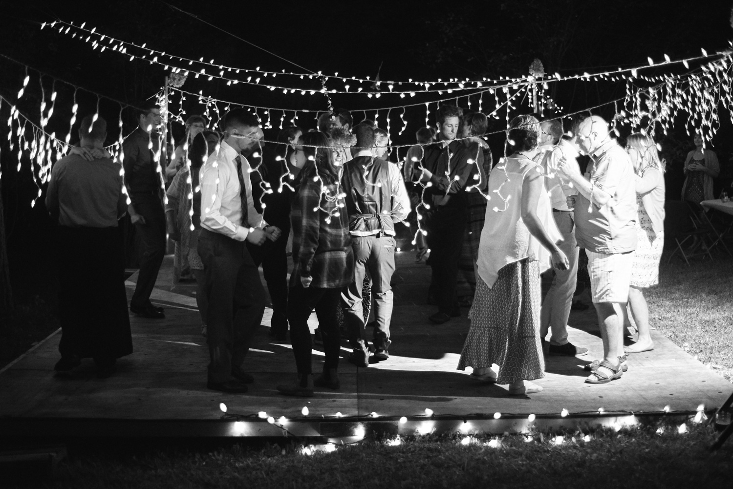 black-and-white-photo-of-a-dance-at-outdoor-reception.jpg