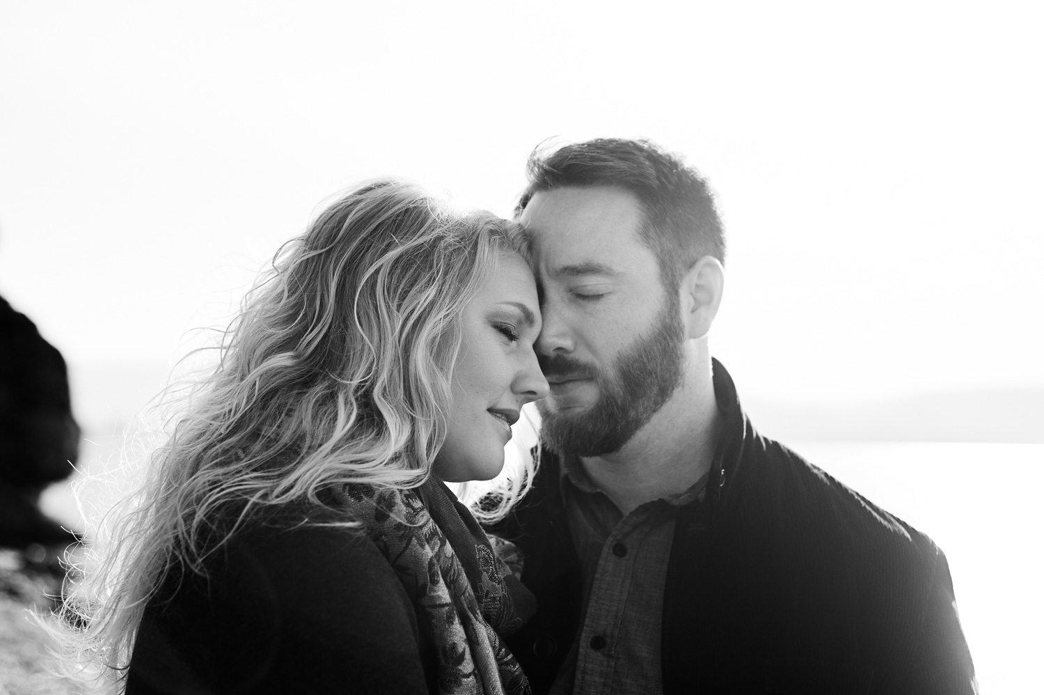 closeup-black-and-white-portrait-of-an-engaged-couple.jpg