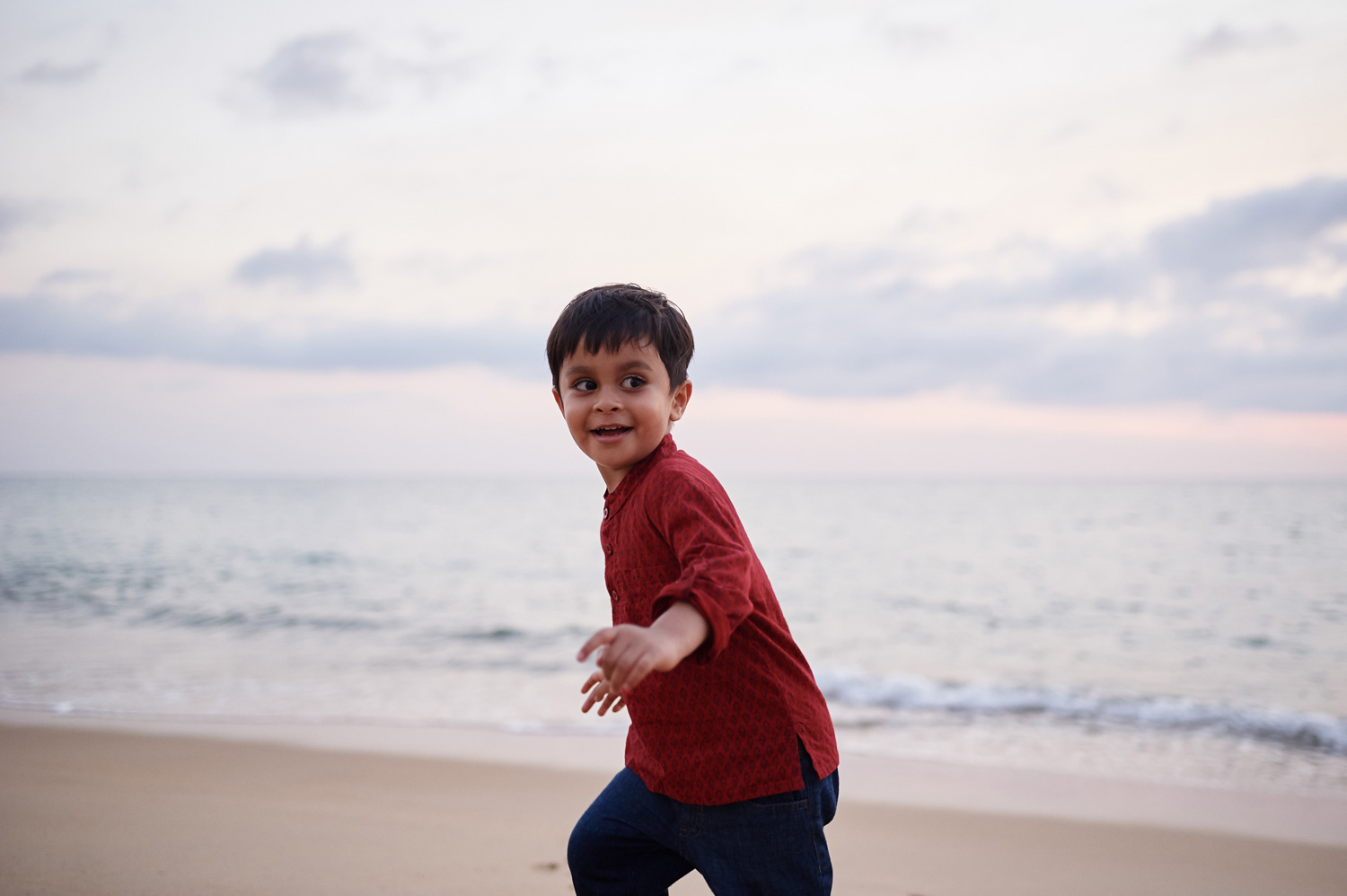 boy-playing-with-his-brother-thailand-family-session.jpg