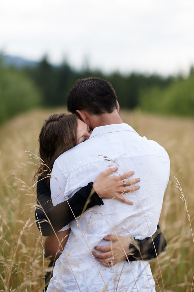 engaged-couple-embracing-in-kamloops-photo-session.jpg