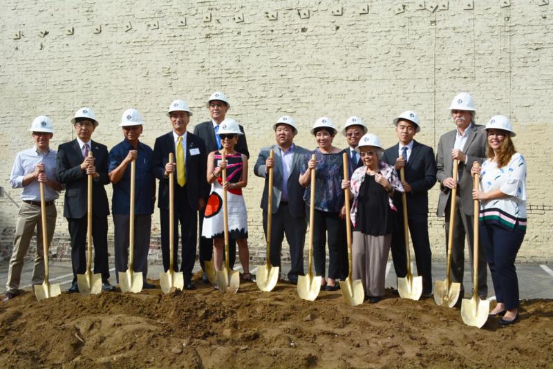 Key representatives, including Mitsubishi Electric US Inc. president and CEO Kent Hora (fourth from left), celebrate at the ground breaking ceremony for the new Budokan in Little Tokyo on August 3. 