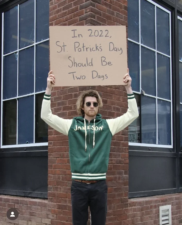 guy with sign.webp