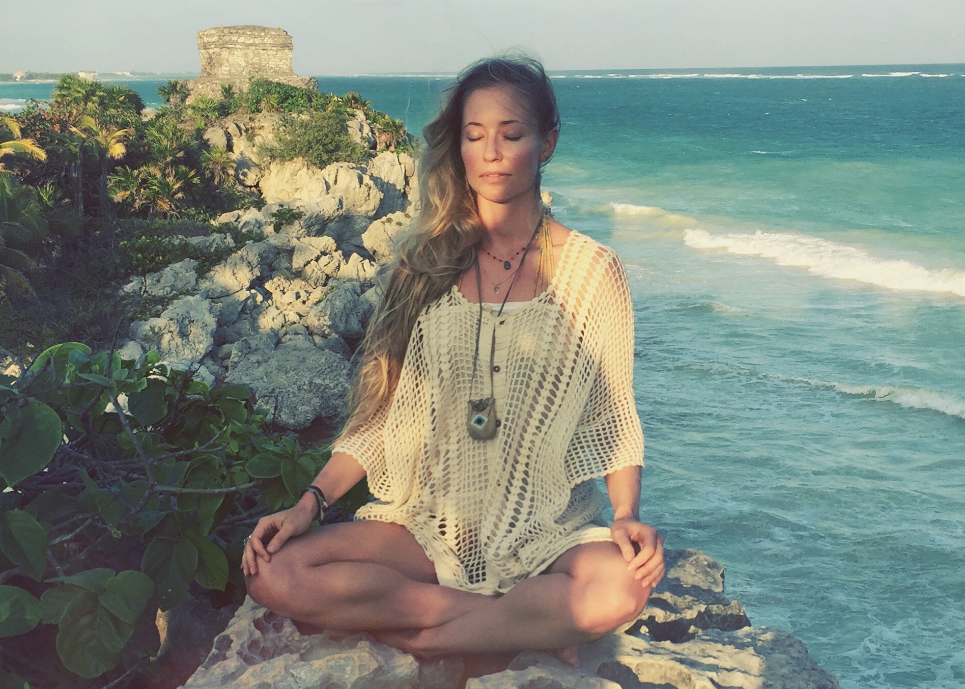 High up on a rock at the Tulum Ruins 