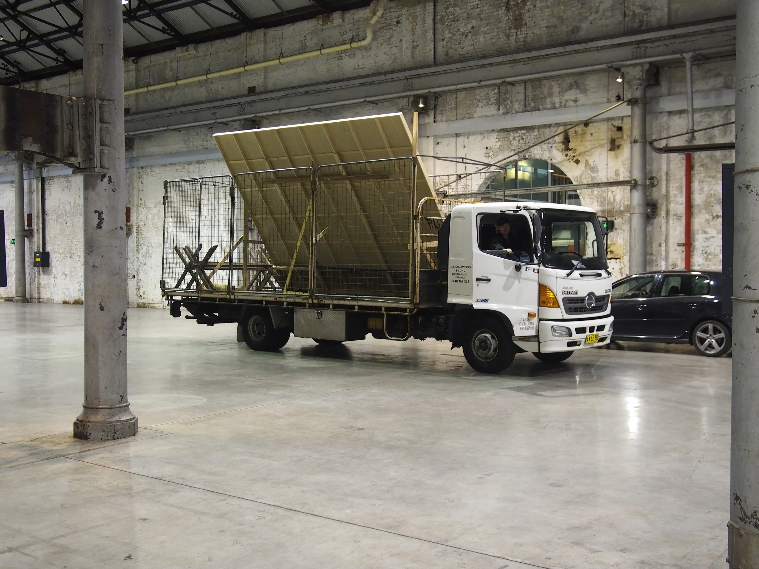 The 6 metre screen being transported in.
