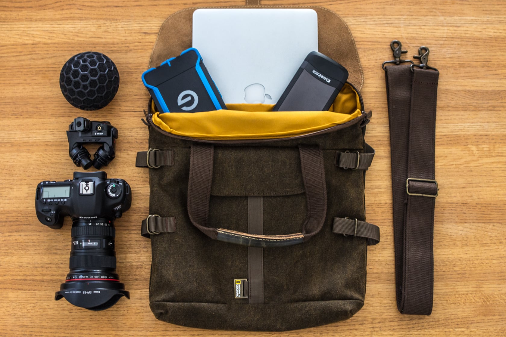 {Pictured: Apple Macbook Pro, G-technology ATC Rugged 1tb drive , Lynktec Reel Juice portable charger, Canon 5dmiii, Rode Stereo Mic X, Nat Geo/ Manfrotto tote bag}