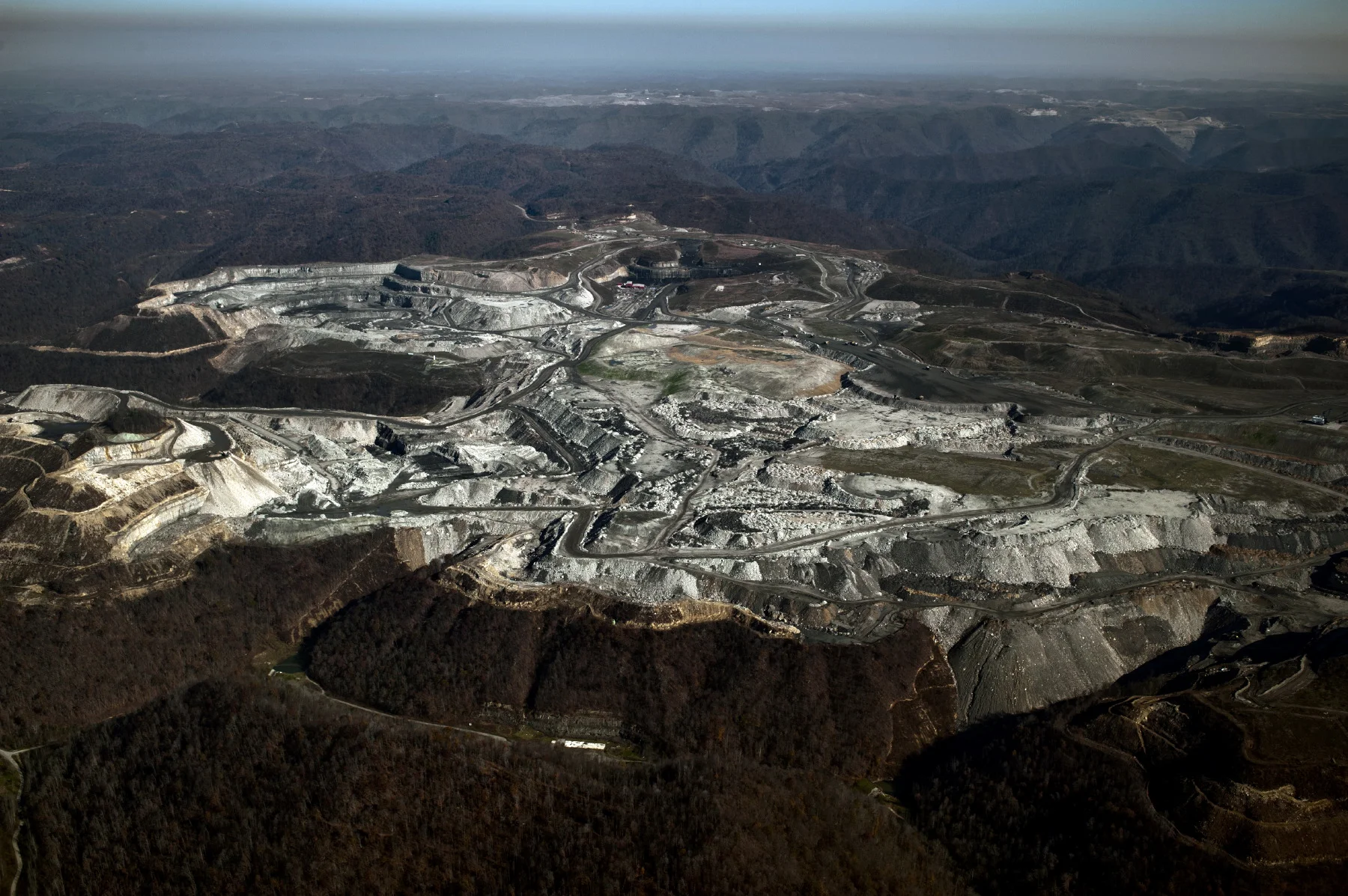 The Twilight Mountaintop Removal mine site as seen from a Southwings fly over.  From their website :   Southwings  provides experiential understanding of environmental challenges and opportunities for conservation.&nbsp; We provide a means to educat