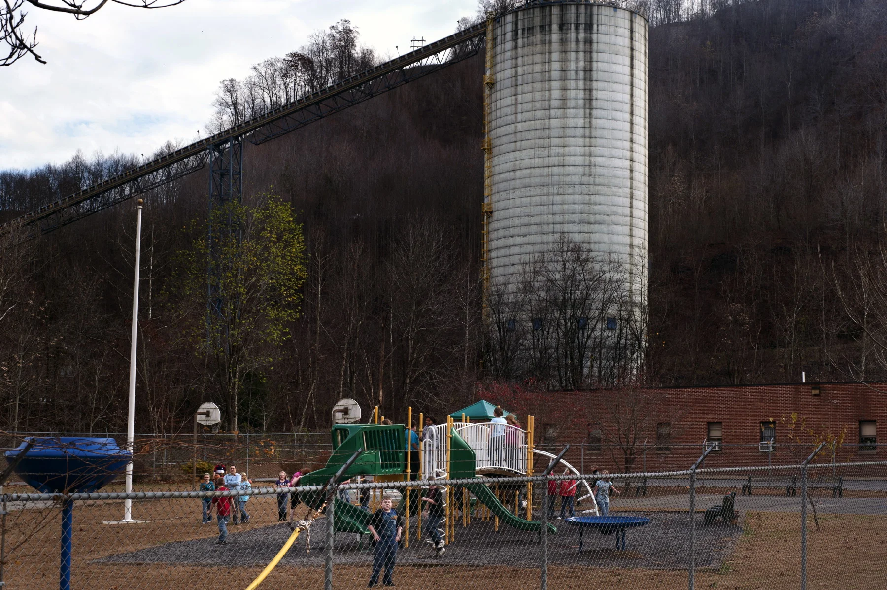 The Marsh Fork Elementary School in Sundial has been a point of great debate. The school is located 400 yards down slope from a mountaintop removal mine. On the mining site above the school, operated by Massey Energy, lies the Shumate sludge impound