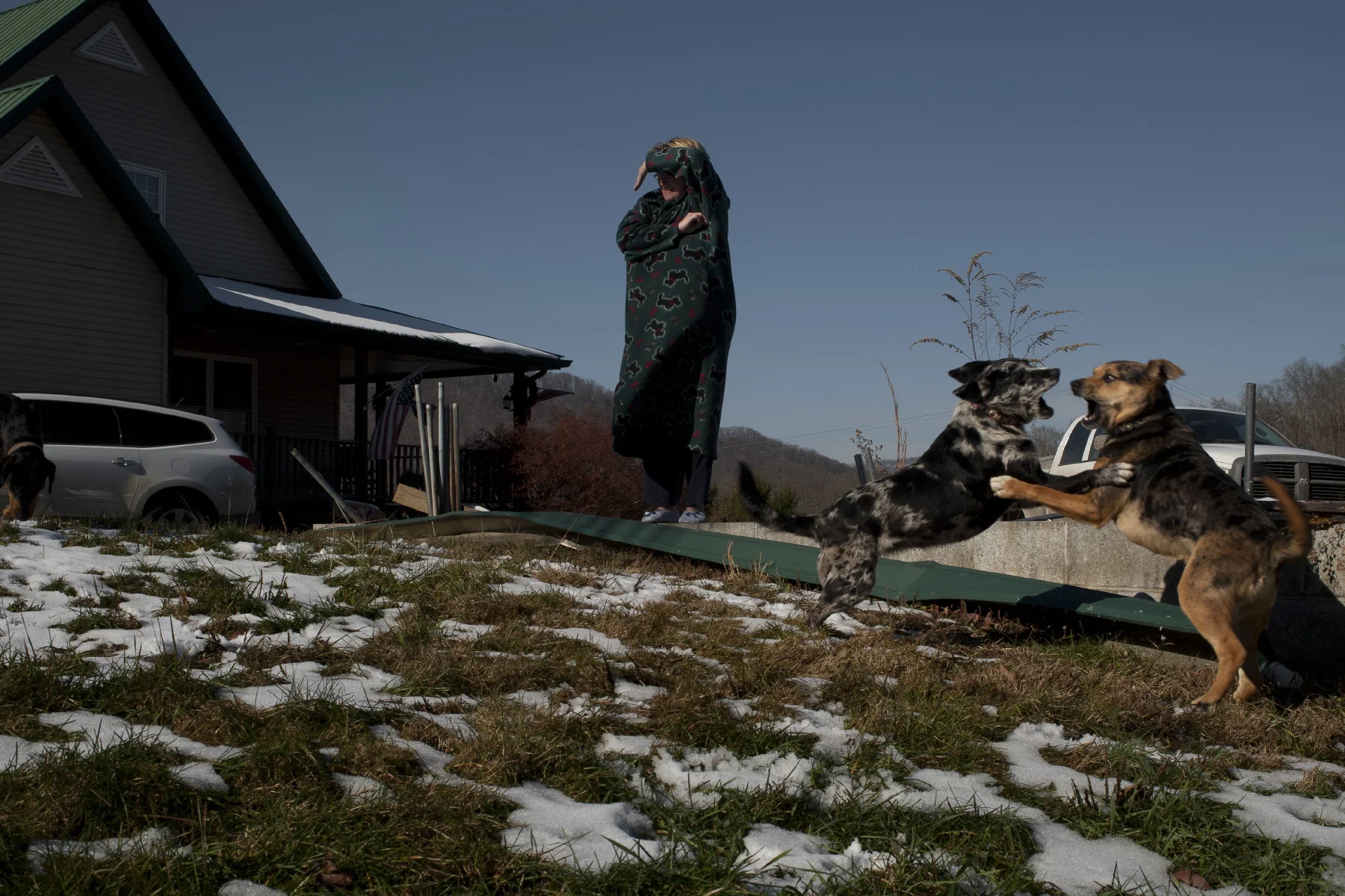  Lick Water WV (USA), December 2010. Jackie waits for her husband to get into their driveway. 