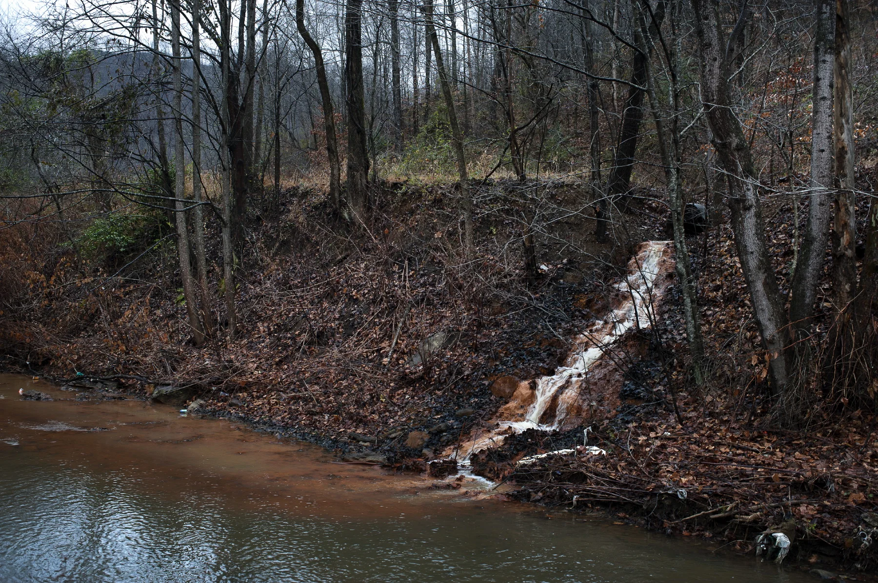  Delbarton, Mingo County, West Virginia, September 2010 Acid Mine Drainage (AMD) is currently the main pollutant of surface water in the mid-Atlantic region. AMD is caused when water flows over or through sulfur-bearing materials forming solutions of