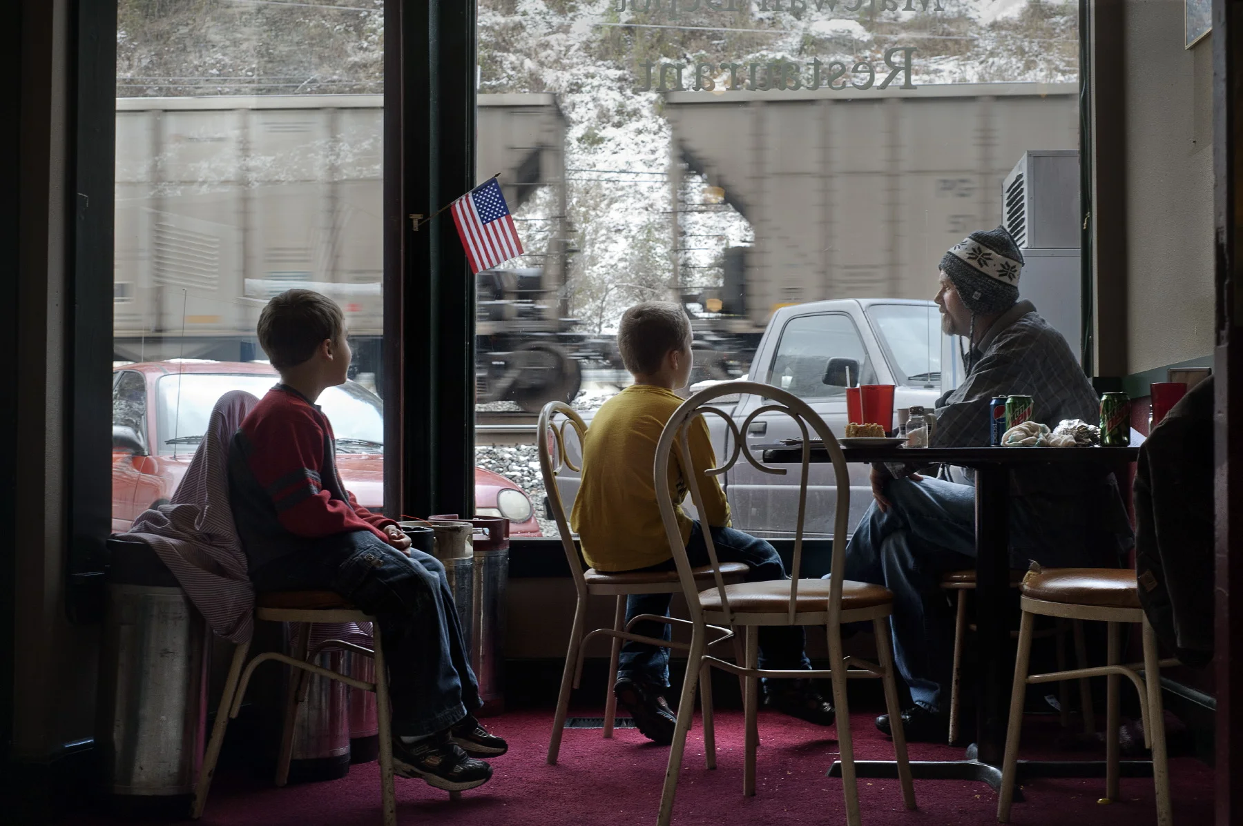  Matewan, Mingo Co., West Virginia, September 2010 - Family watching a coal train hauling away from the town. Mingo County is a place of hystorical significance for coal miners and Unions on the account of The Battle of Matewan (also known as the Mat