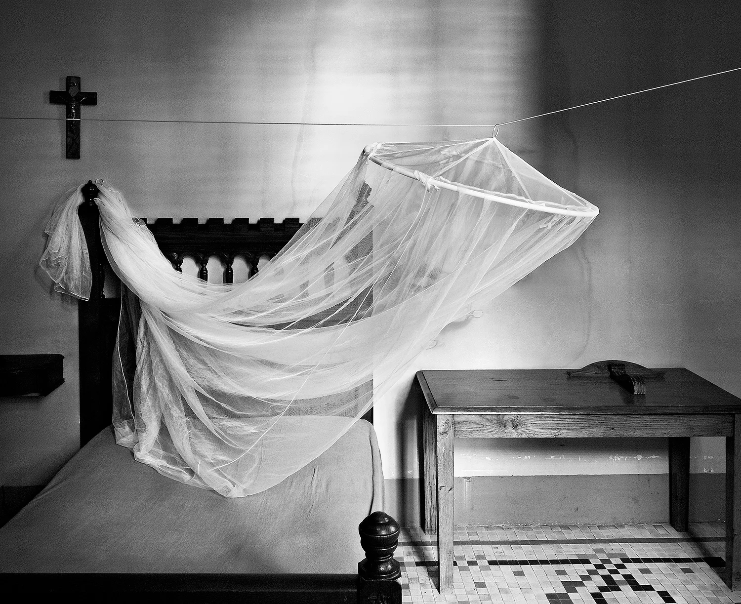 Cama con mosquitera