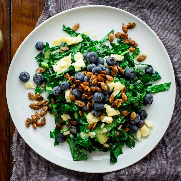 kale-salad-with-blueberries-manchego-and-pumpkin-seed-clusters-sq2-006.jpg