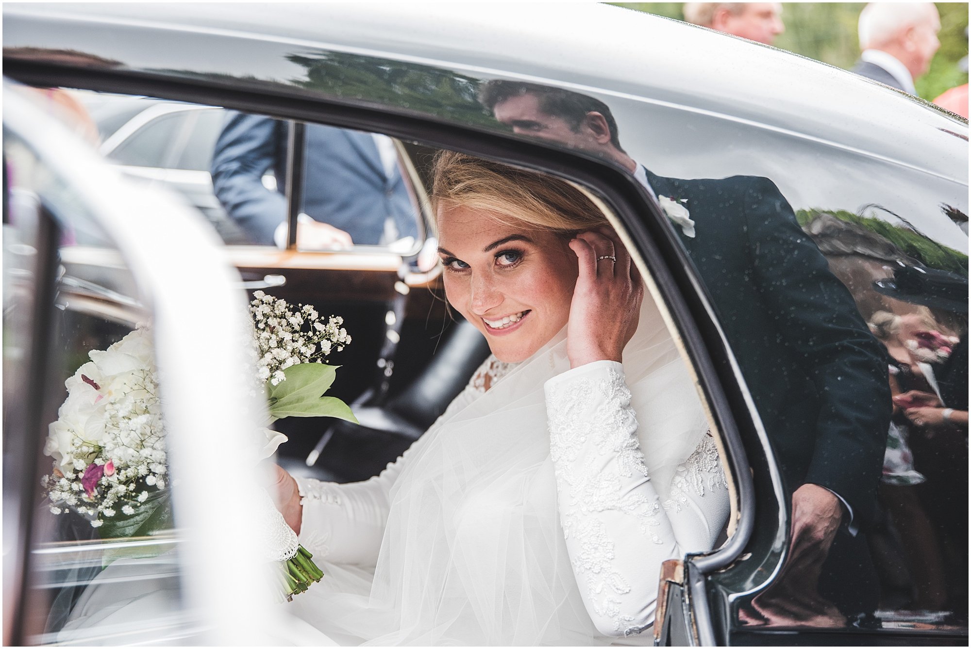 Bride in wedding car