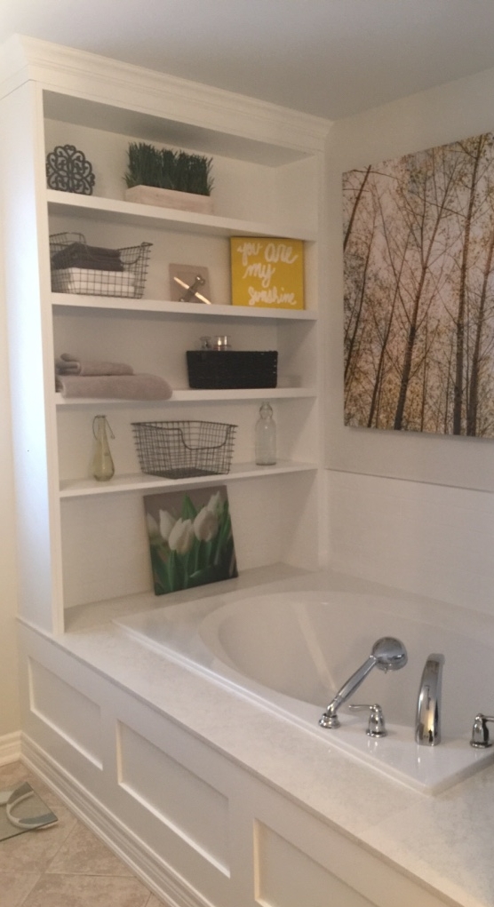 New tub surround, panelling and built-in shelves