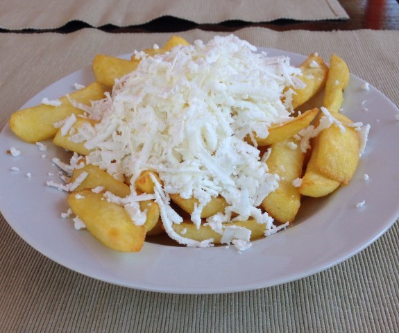 I treated myself to potatoes with feta only a couple of times. This snack reminds me of visiting the Black Sea in 1984, where I had them with fried sprats, tasty little fish, and beer.