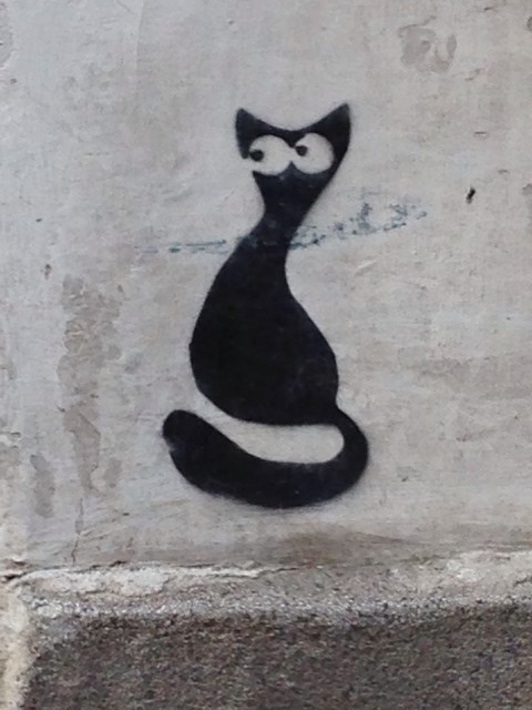  Now that we've eaten, let's have a look at Bulgarian street art.  I think I've seen this cat before. Looks suspicious. 