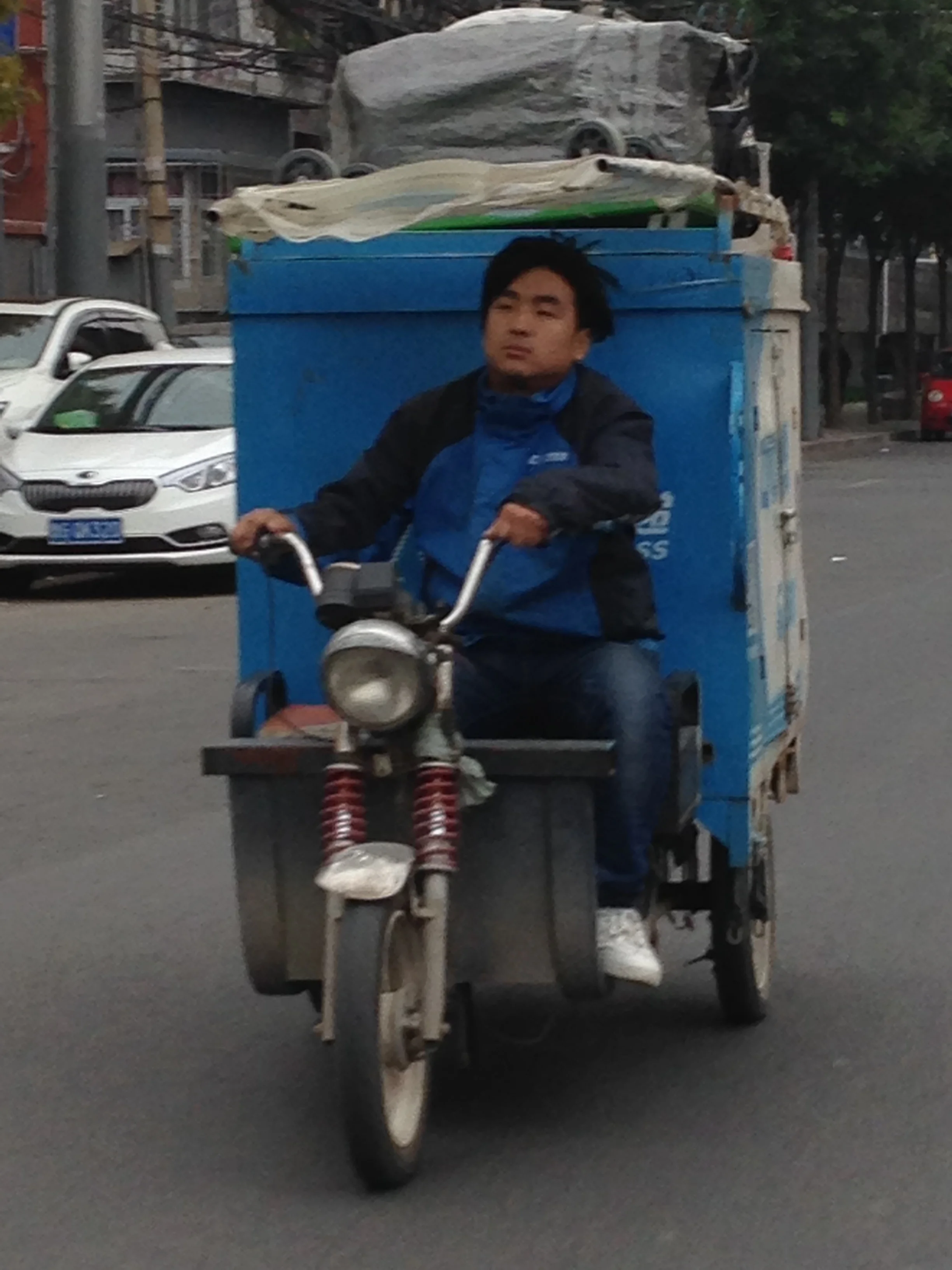 Tuktuks carry goods as well as people.