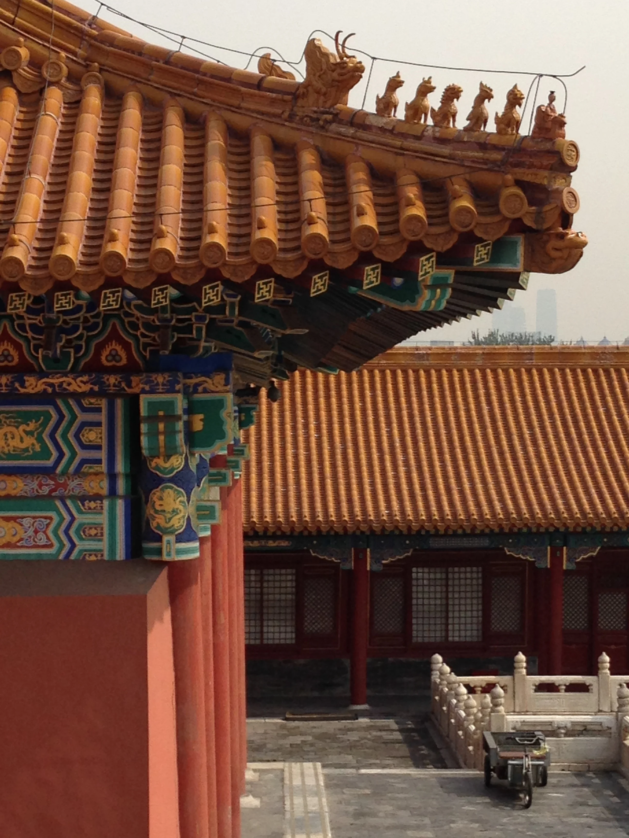 I love the details, including the gold figures on the eaves.
