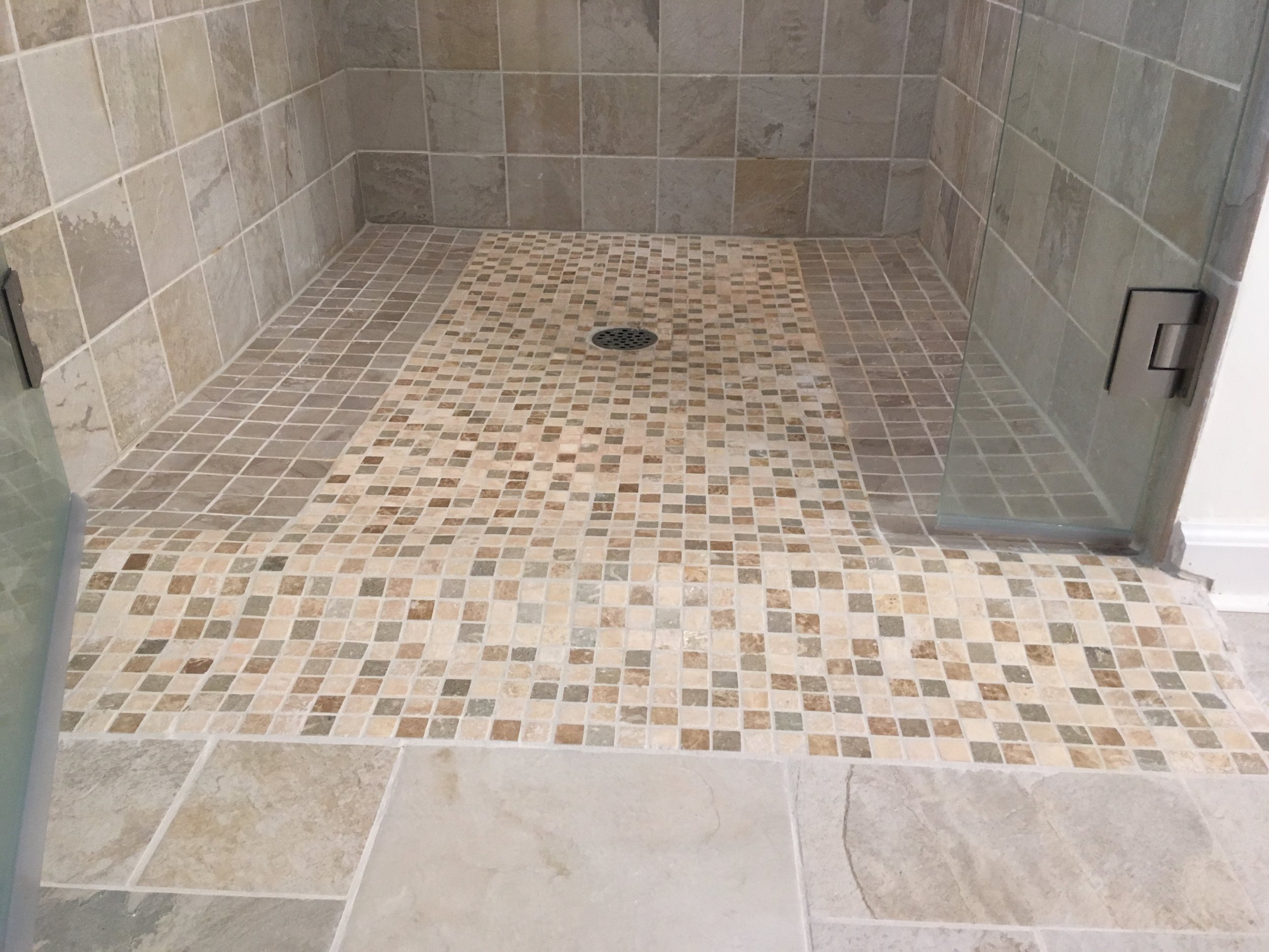  New tiled bathroom complete with Rain-X coating for glass doors, two niches, all new shower plumbing fixtures and tiles. 