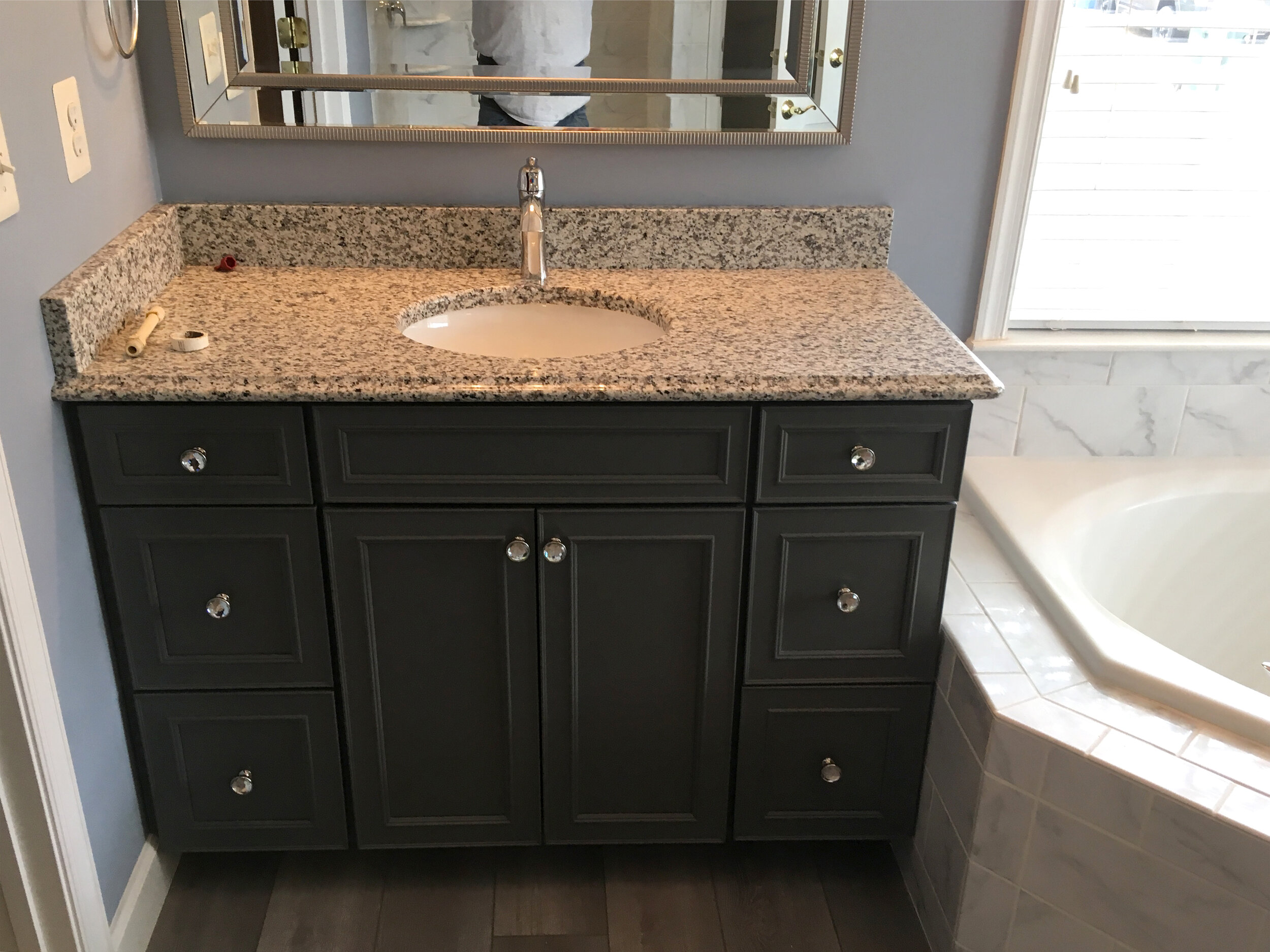 Cabinet-with-Luna-Pearl-granite-countertop.JPG