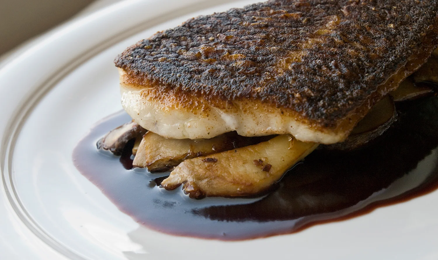 Crispy Chinese Spiced Black Bass with Porcini Mushrooms and Port Wine Reduction