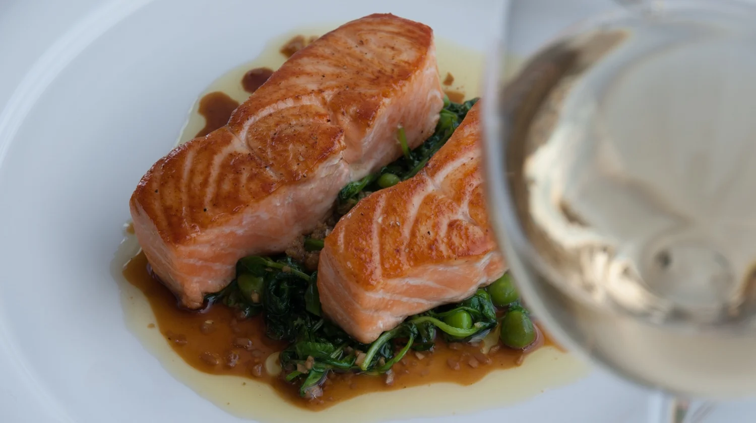 Seared Salmon; Sautéed Pea Shoots and Ginger-Soy Vinaigrette