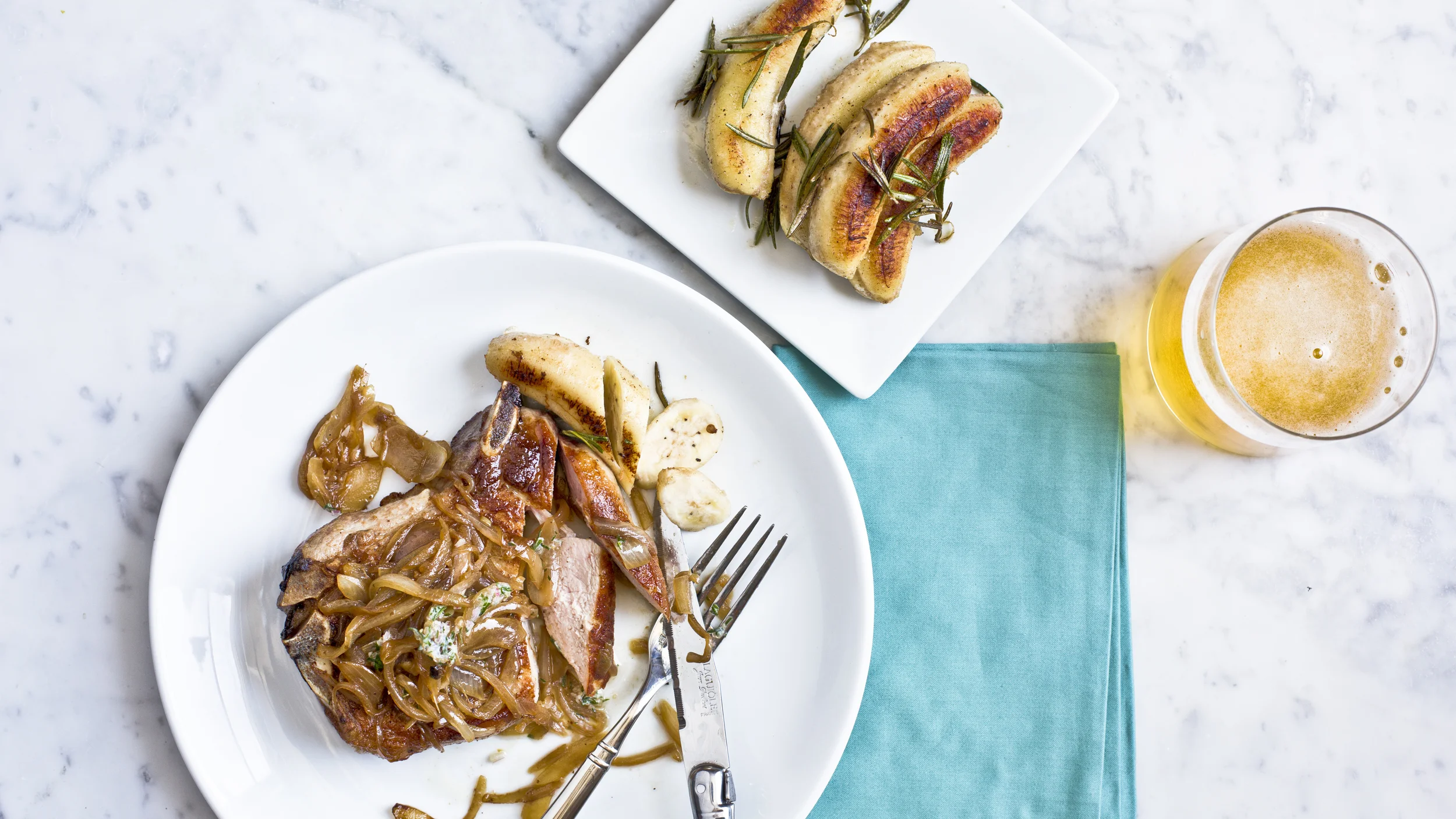 Pan Roasted Pork Chop Encebollado with Rosemary Scented Bananas
