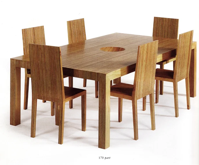 2002 Carved Plywood 29 x 70-1/5 x 39 in (73,6 x 178 x 99cm) Nature Morte Bowl Dinner Table is an homage to the grandmother of Sebastian ErraZuriz who always decorated the dining table with a porcelain bowl filled with fake fruit. In an attempt to invite new generations to incorporate this family tradition, the artist includes a bowl carved into the surface of the table made of plywood blocks. With his Nature Morte Dinner Table, Sebastian became, at the age of 28, the second living South American artist to have work auctioned at Sotheby's Important Twentieth Century Design year of sale.