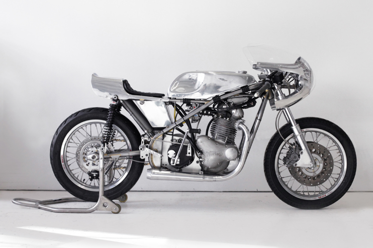 2013 Collaboration with Worth Motorcycle Company and NYC Norton Norton motorcycle, aluminum, steel and glass with taxidermy 46 x 84 x 16 in (116,8 x 213,4 x 40,6 cm) The customized speed bike of Sebastian ErraZuriz is a functional racing bike that is also a fetish object stripped down to its sculptural framework. A masculine symbol of power and freedom, the motorcycle also functions on the boundary of fragility and fatality--between the epic tagline living fast and dying young. ErraZuriz has inserted a taxidermy bird inside a glass vestibule in the motor of the bike, the body which the rider straddles. Under the tank, the bird lays as if in a metal and glass coffin, functioning like the heart of the object, and as a symbol of awareness to nature, death, and fragility of the body. The bird decontextualizes the bike from its function, making death a core element. The Motorcycle was produced by Worth Motorcycle Company and built by the incredible team at NYC Norton who offered all the technical and constructive support to create Sebastian ErraZuriz's unique design.This project was made possible thanks to the generous support of motorcycle collector John Magyar. A portion of profits will be donated to Worth Motorcycle Company, a nonprofit organization teaching NYC’s at-risk youth the art of vintage motorcycle restoration.