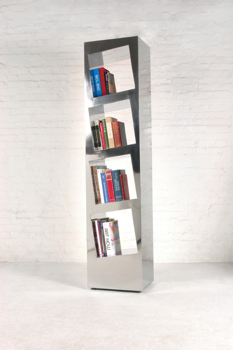 2007 Stainless steel 75-1/4 x 17-1/4 x13-3/4 in (190,5 x 43,2 x 34,4 cm ) Leaning Stainless Steel Shelf seeks to create functional volumes within a sculptural volume. The slanted sides allow the books to always stay in order and the stainless steel reflects the colors of the books placed in its interior almost like the surface of a mirror.