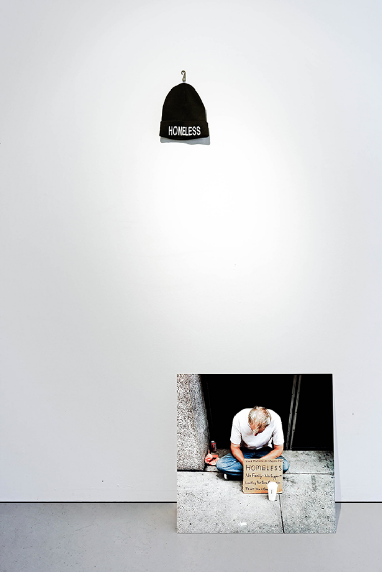 2012 Embroidered wool hat and photograph Dimensions variable New York has over 50,000 homeless people in municipal shelters. 22,000 are children. Recent statistics show that homelessness has already increased 13 percent more in 2013 than in previous years.