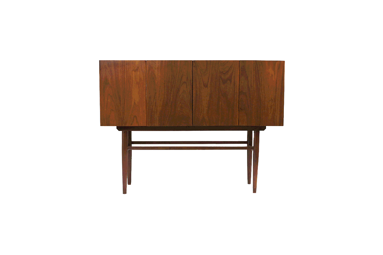 2013 Walnut, Mirror, Glass, Bronze, Optical lens and Electric components H: 43 x W: 56 x D: 15 1/4 in (109 x 142 x 39cm) "The space between the void" (The Kaleidoscope Cabinet) is another attempt to deconstruct the paradigm that a cabinet should simply be a box with two doors. The cabinet is part of a series of exercises that includes the Porcupine cabinet and several more deconstructed cabinets that we will be presented in the next months. This particular cabinet was created in memory of an old aunt I had when growing up that always told us we could "look but never touch" the beautiful objects she had in her house. The fact that these objects where out of bound only made them more magical for my brothers and I who where mesmerized in every visit. "The space between the void" offers a reflective cabinet that will multiply what ever is placed inside it, thus painting its interior with the colors and patters of the belongings of its owner. The cabinet includes an interior light and a peep hole so that when its doors are closed and the cabinet is locked. The viewer can still peer inside and see the objects multiplied infinitely like a kaleidoscope offering a glimpse of its precious belongings to those of us allowed to "look but never touch".