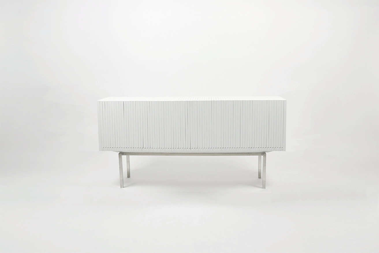  2014 Lacquered Baltic Birch, Steel and Glass H: 31-1/4 x W: 71-1/2 x D: 15 in (H: 79 x W: 181,5 x D: 38cm) The Wave Cabinet by Artist and designer Sebastian ErraZuriz is the new creation of his series of functional sculptures, which embody his translation of craftsmanship and mastery of material into fine art. The Wave cabinet opens with true delicacy and beauty; each individual slat pulls along the following much like a paper fan. With multiple configurations which allow for various options of aperture, the artist has re-engineered the familiar process of opening and closing, into rotating and undulating adaptations. The ‘Wave cabinet reinvents the paradigm of cabinet as a re-visualization of the domestic, quotidian objects that surround us. Like his previously surprising sculptural furniture, Sebastian invites us to break open the box as a literal metaphor for reminding the viewer to stop and look again. The New York based artist explains: "I am inviting people to look at one of the simplest forms of furniture design and to forget that we’re talking about furniture, instead to see it as a way of breaking a box. I love the idea of creating beautiful furniture; nevertheless I am much more interested in using the medium as an excuse to trigger people's curiosity and create a connection with them".