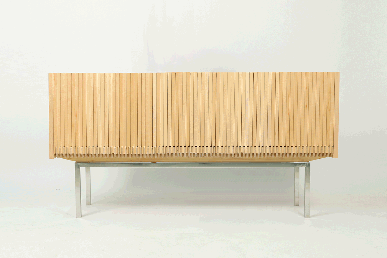 The Wave Cabinet by Artist and designer Sebastian ErraZuriz is the new creation of his series of functional sculptures, which embody his translation of craftsmanship and mastery of material into fine art. The Wave cabinet opens with true delicacy and beauty; each individual slat pulls along the following much like a paper fan. With multiple configurations which allow for various options of aperture, the artist has re-engineered the familiar process of opening and closing, into rotating and undulating adaptations. The ‘Wave cabinet reinvents the paradigm of cabinet as a re-visualization of the domestic, quotidian objects that surround us. Like his previously surprising sculptural furniture, Sebastian invites us to break open the box as a literal metaphor for reminding the viewer to stop and look again. The New York based artist explains: "I am inviting people to look at one of the simplest forms of furniture design and to forget that we’re talking about furniture, instead to see it as a way of breaking a box. I love the idea of creating beautiful furniture; nevertheless I am much more interested in using the medium as an excuse to trigger people's curiosity and create a connection with them".