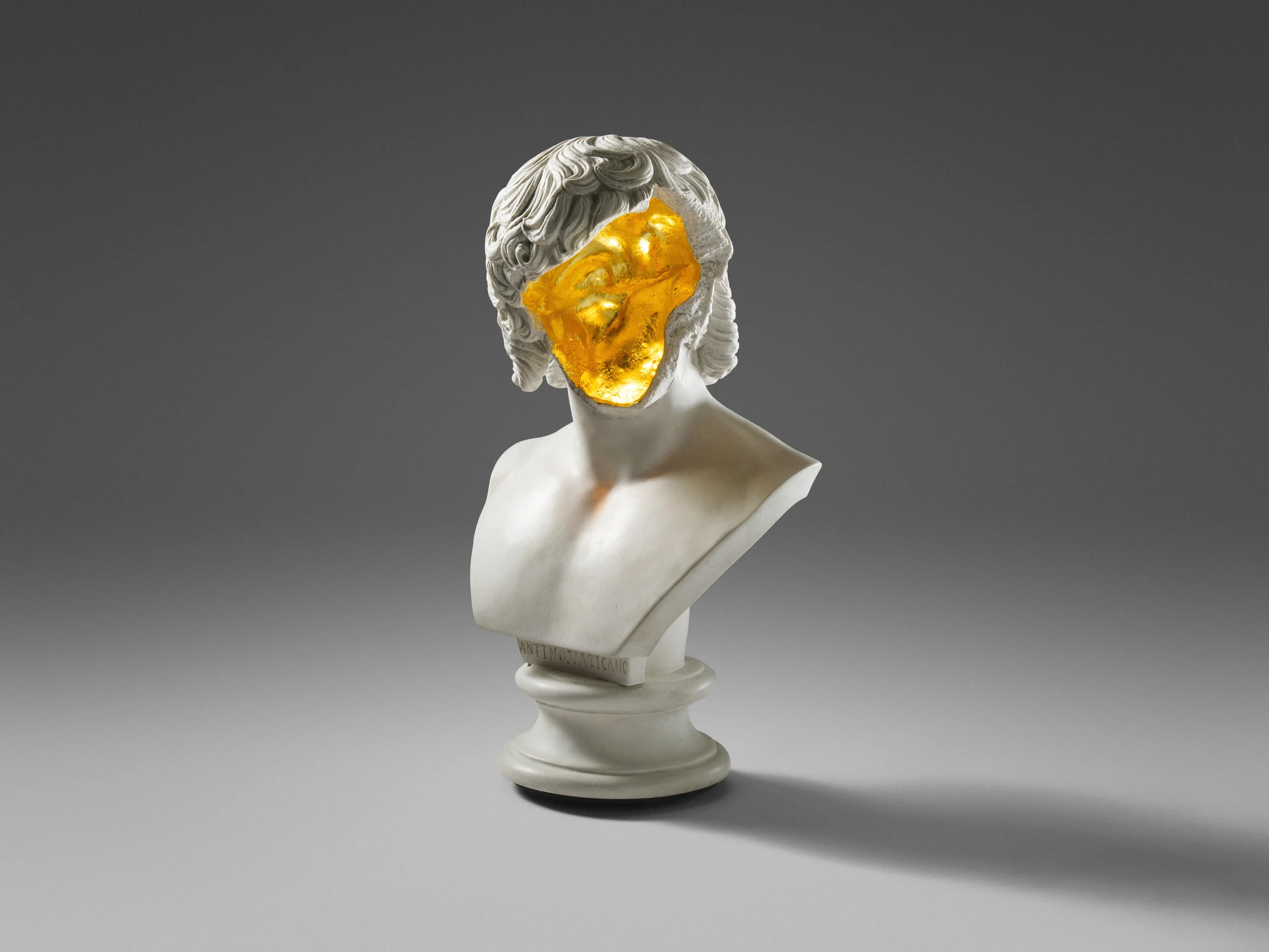 This work is a part of a new exhibition in David Gill Gallery based at London. The exhibition will showcase Greek and Roman masterpieces from renowned museums, 3D scanned, digitally manipulated and re-cast in marble as functional sculptures. "I use technology to “steal” classical sculptures I have revered since childhood. Claim their shapes as raw material to build my own new works. It’s an act of gluttony and lust to appropriate that which belongs to the sacred world of the arts and use it freely in an exploration of its boundaries within the realm of the functional and the mundane. "– Sebastian Errazuriz. Following his recent ‘Antiquity’ (2014) in which Errazuriz transformed the historic icon into a functioning bookshelf, this new series of limited-edition works pay homage to ancient sculpture while blurring the boundary between art and design. For the Bookcase ‘Antiquity Shelves Nike’ (2017), a replica of the headless Nike (Winged Goddess) is enveloped in a wooden ‘scaffold’ that functions as shelving. Errazuriz’s experimentation with innovative processes in design and art include augmented and virtual reality. Parallel to the investigation between art and design, Errazuriz dives headstrong into the question of breakage as a vital aesthetic resource, whether it is historical and accidental, or artistic and purposeful. "Many of the sculptures we have learned to love and revere are broken, fragmented.Would they be as mysterious and fascinating to us if we could see them in their pristine original appearance?” Errazuriz confronts various subjects and intellectual questions in this series of works, maintaining the precarious balance of tension and release, reverence and sacrilege, delicacy and brutality.