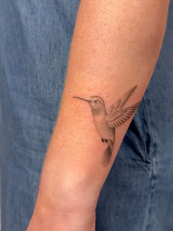 Cool placement for this hummingbird tattoo. Thank you, Katie!