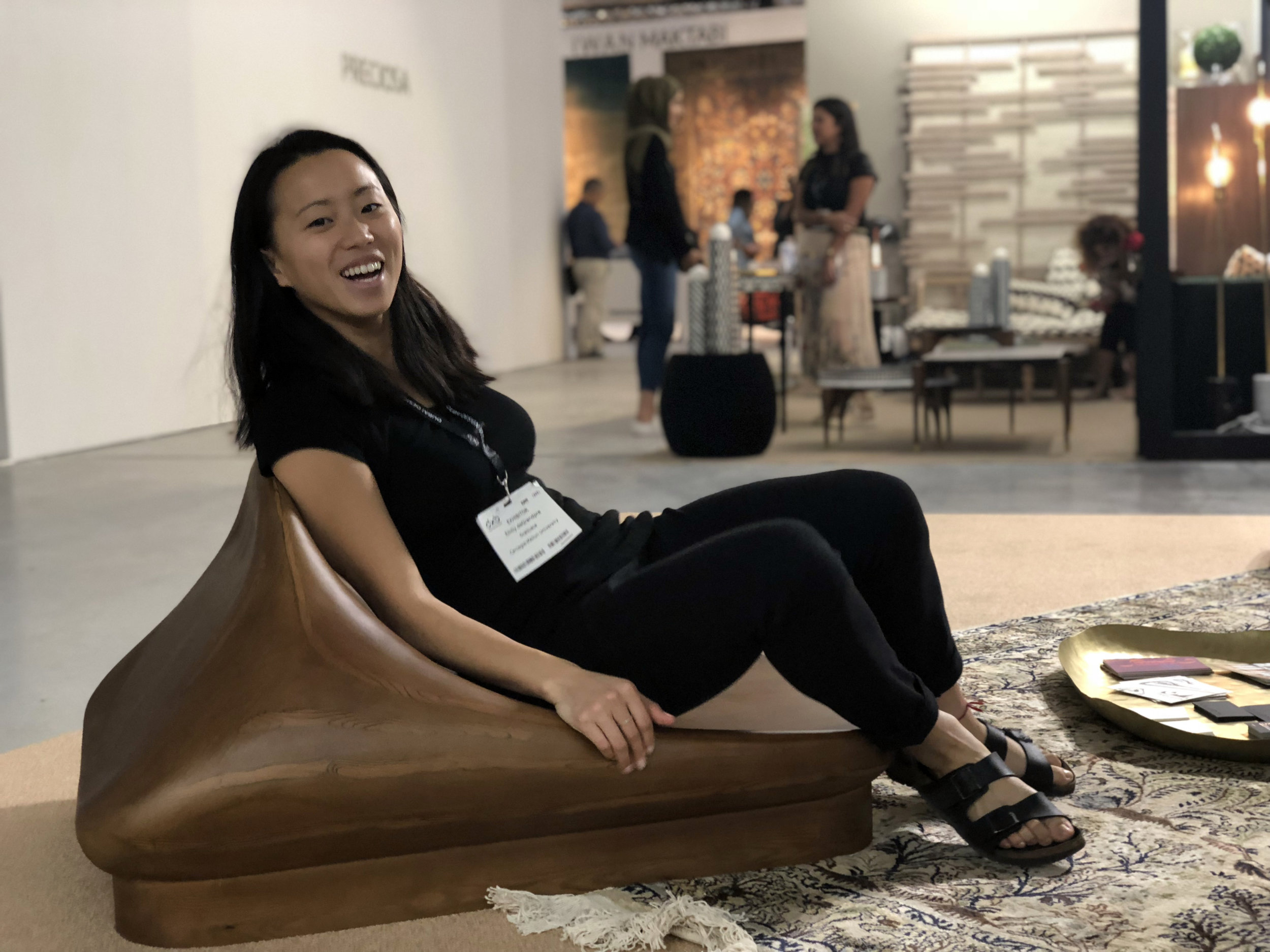 Emily sitting on a chair.jpg