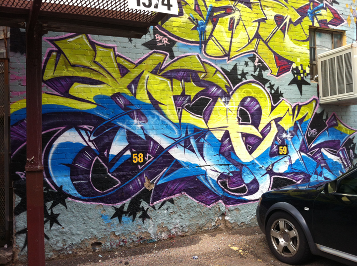 This "Awful" piece is right below the Taste mural. Double stacked and painted with permission.