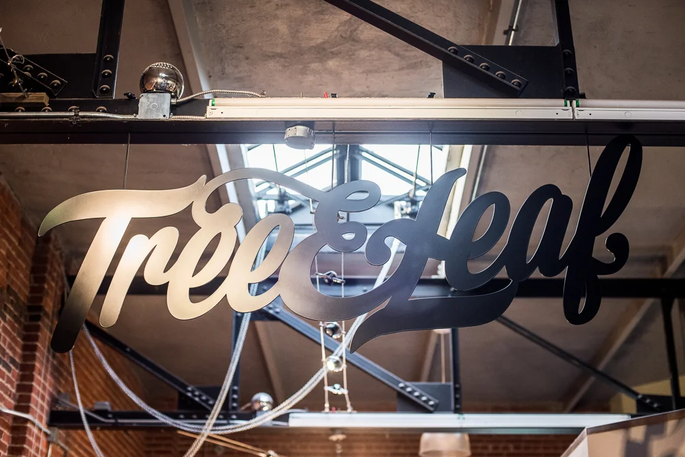 A big accent piece to our new store is the massive steel sign designed by us and built by our friend, Patrick O'Brien.