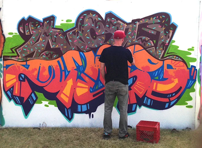 Jake Beeson getting down with a little 'YoMoms' jam. We hosted Jake's art the night before at LIVE on the Plaza.