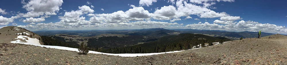 The summit of Little Costilla Peak to the left, Billy Wiginton (for scale) to the right.