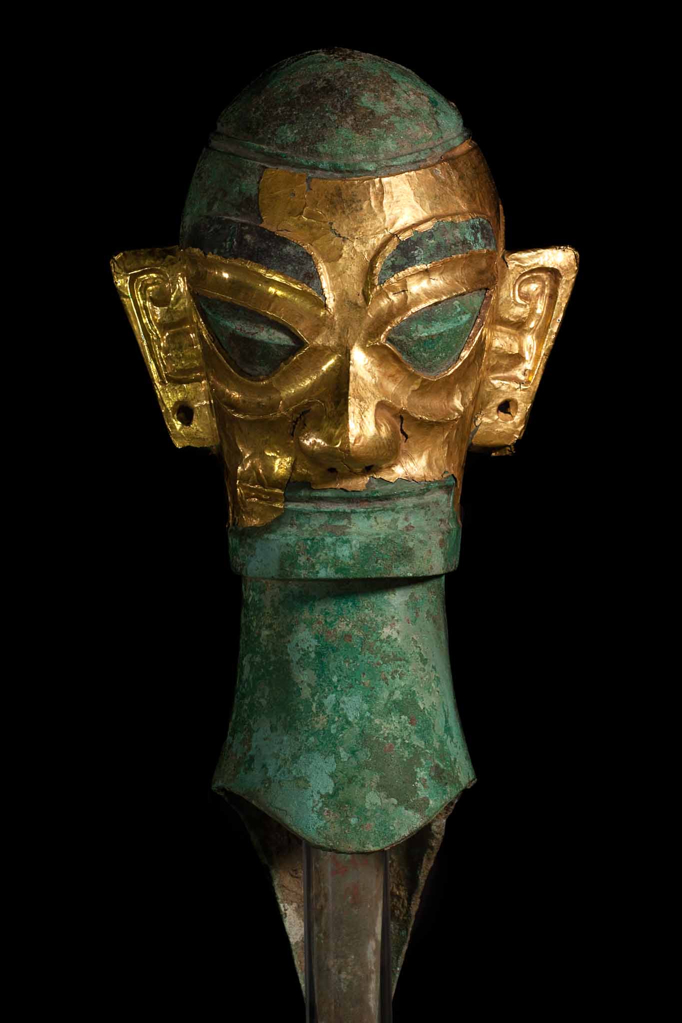 Human Head with Gold Foil Mask