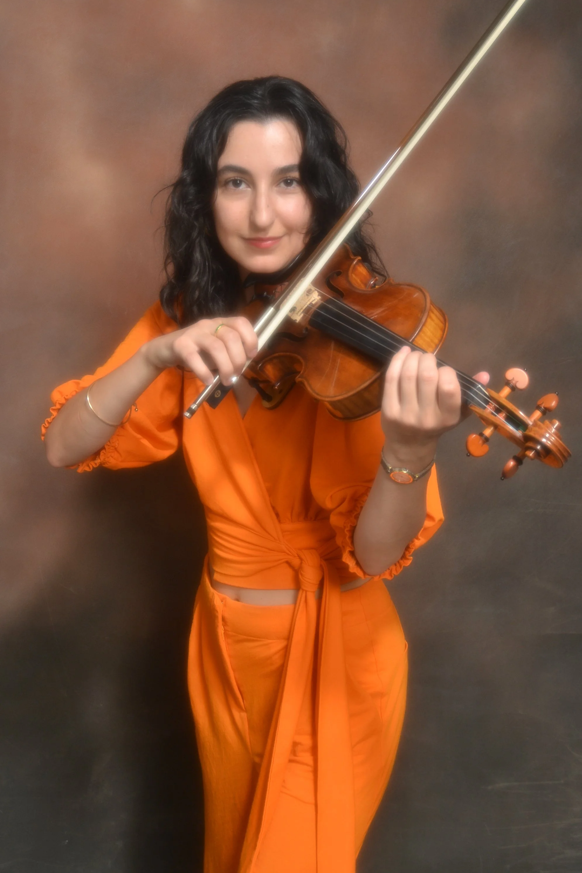 Sophie Poteratchi, MMus BMus (Hons), Founder and Artistic Director of City String Ensemble, a Guildhall-trained violinist and arranger based in London.