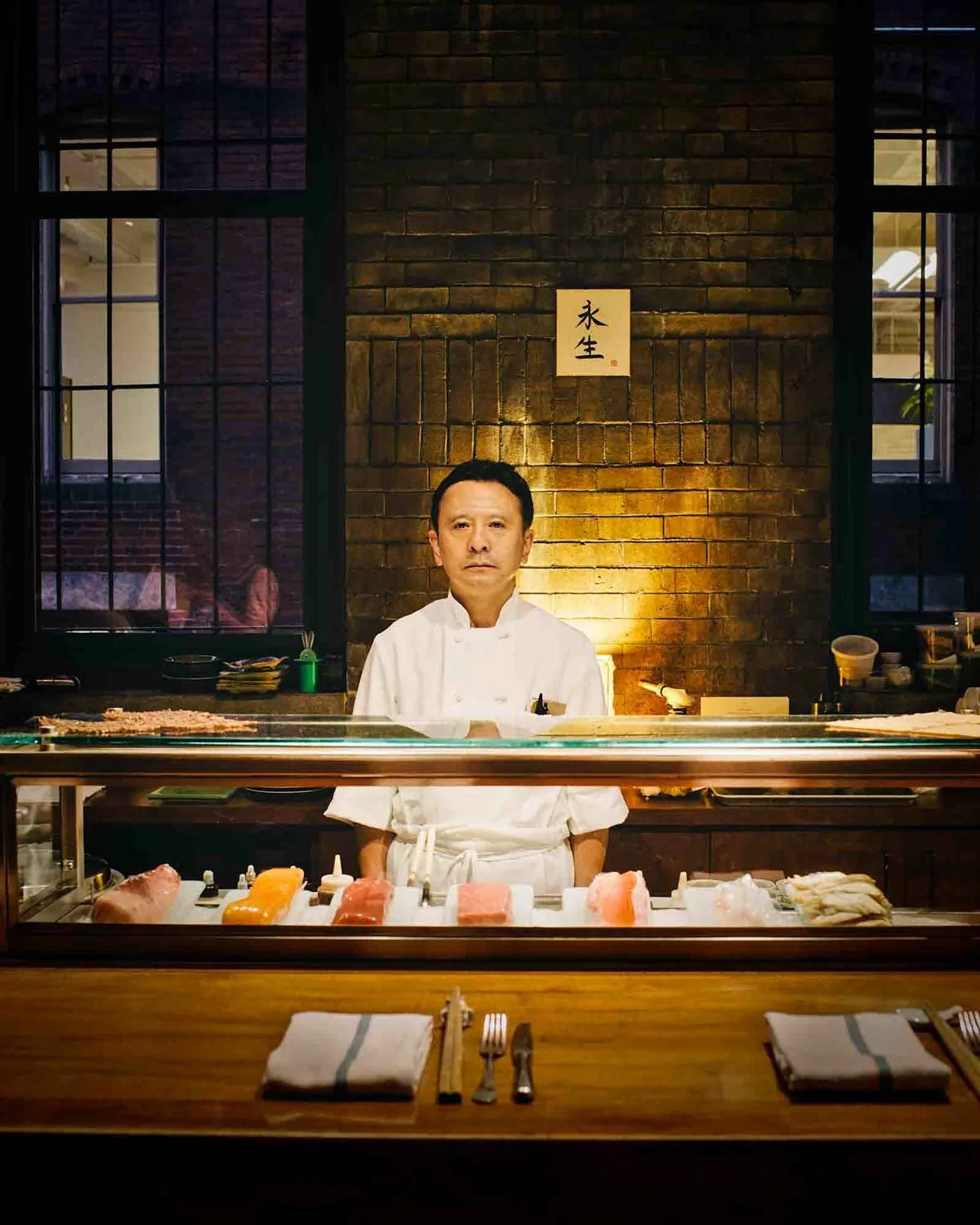 Sushi chef working at O Ya Boston in 2014 photographed by Adam DeTour for Boston Magazine