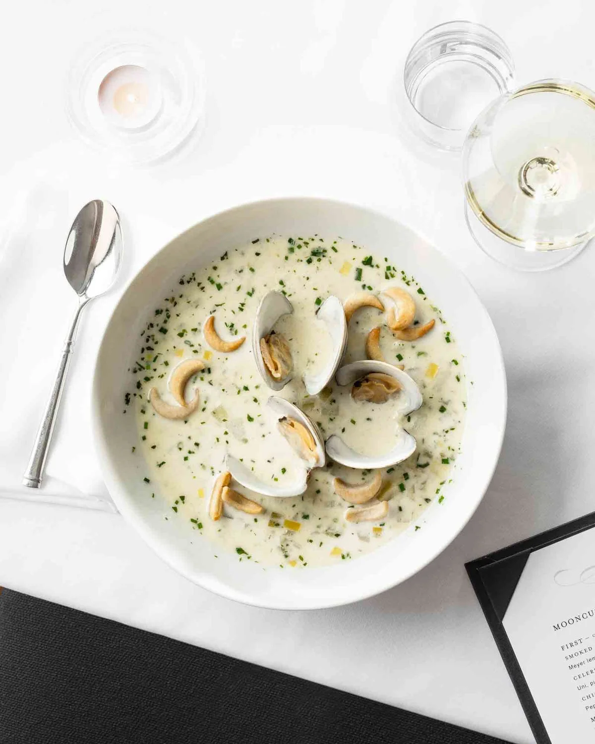 Clam chowder at Mooncusser restaurant in Boston MA photographed by editorial food photographer Adam DeTour for Boston Magazine