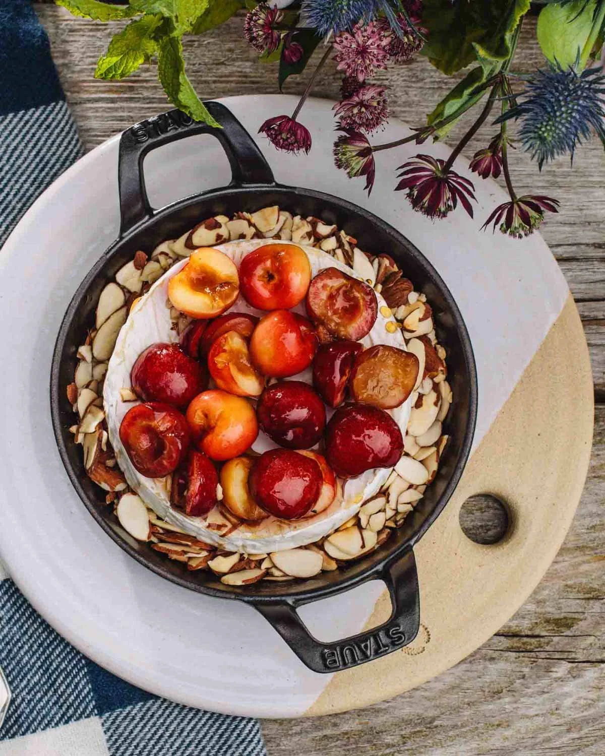 Cherry cheesecake in cast iron skilled by cookbook photographer Adam DeTour for the Weston Table