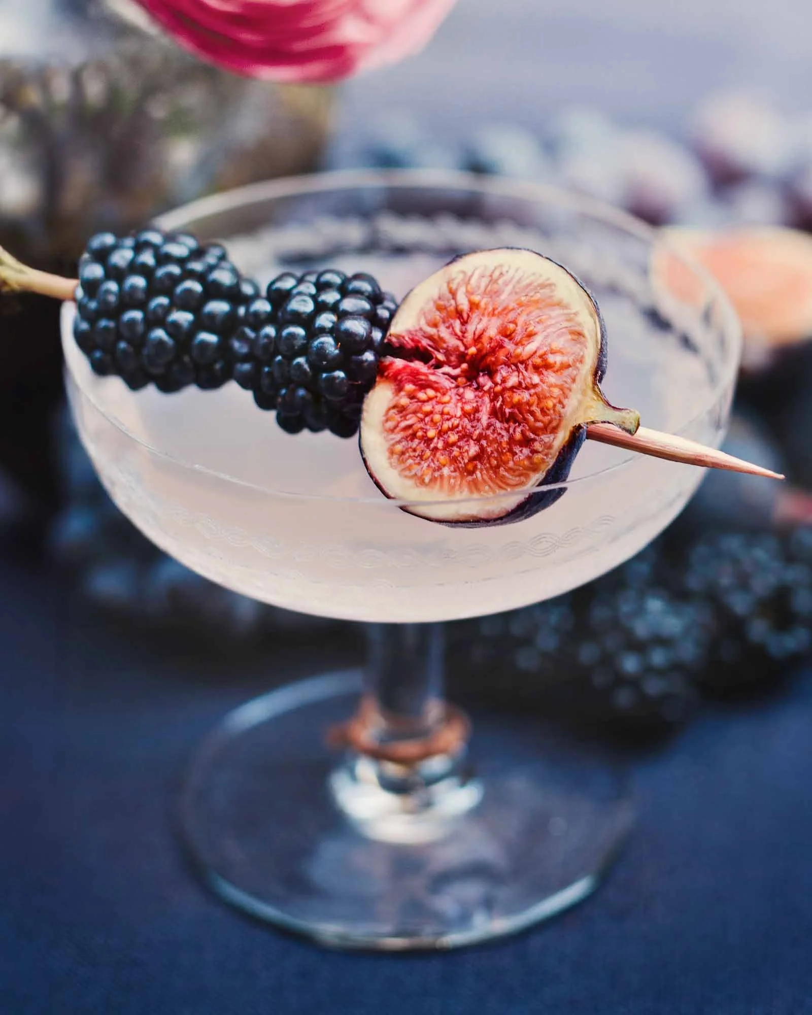Image of a drink surrounded by berries by Boston beverage photographer Adam DeTour