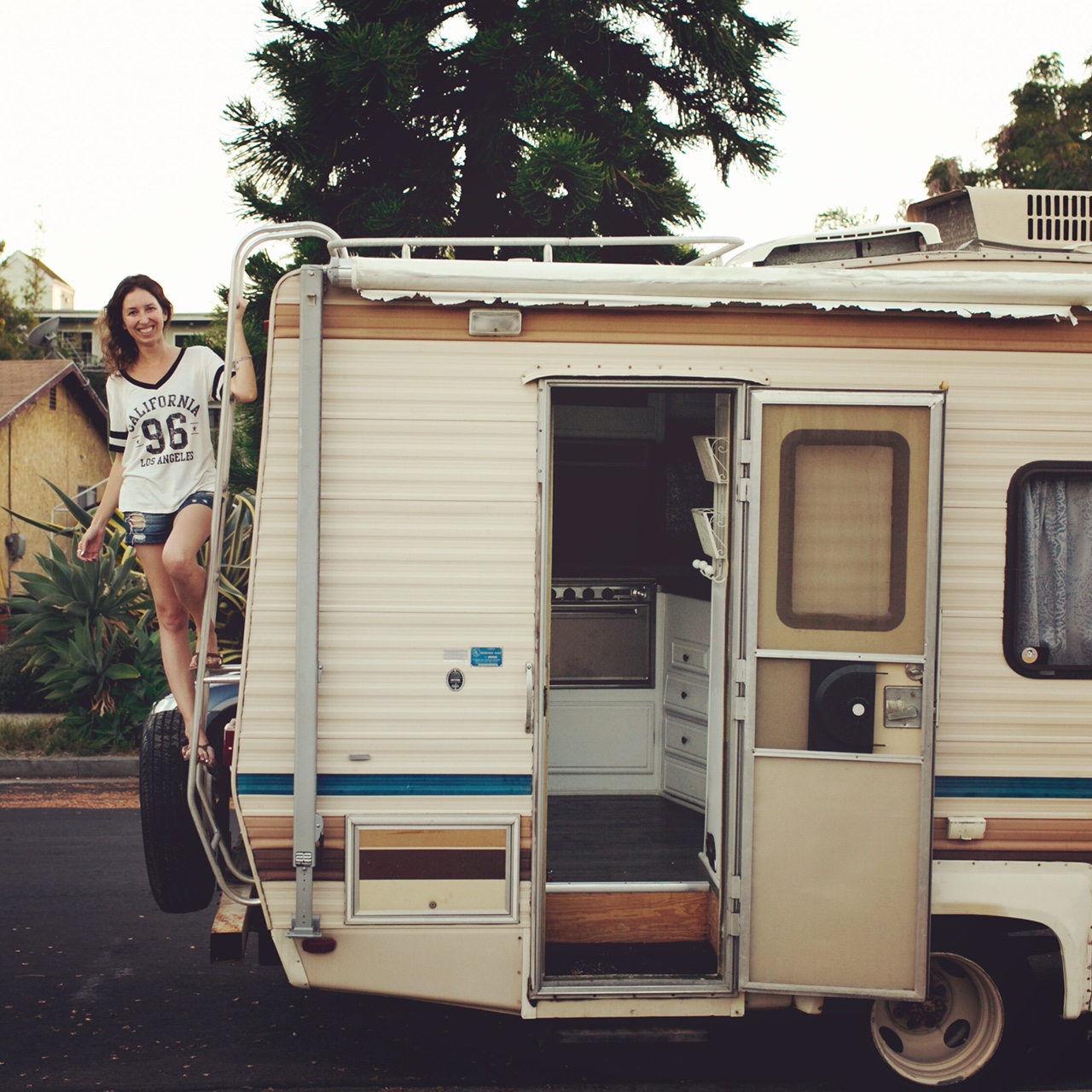 Rachel and her RV—ready for some epic adventures
