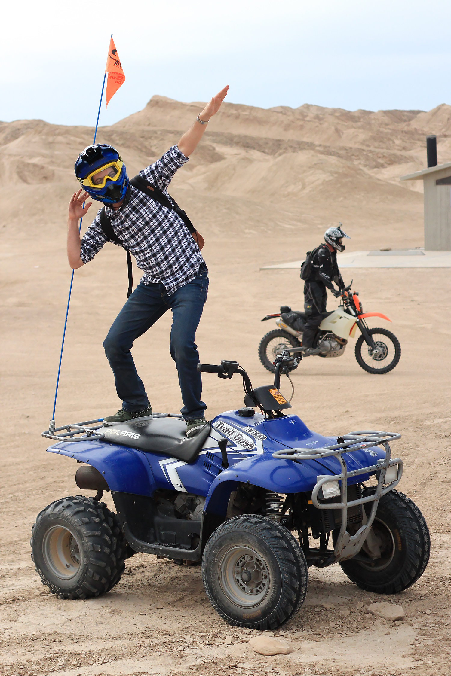 John striking a pose on the ATV