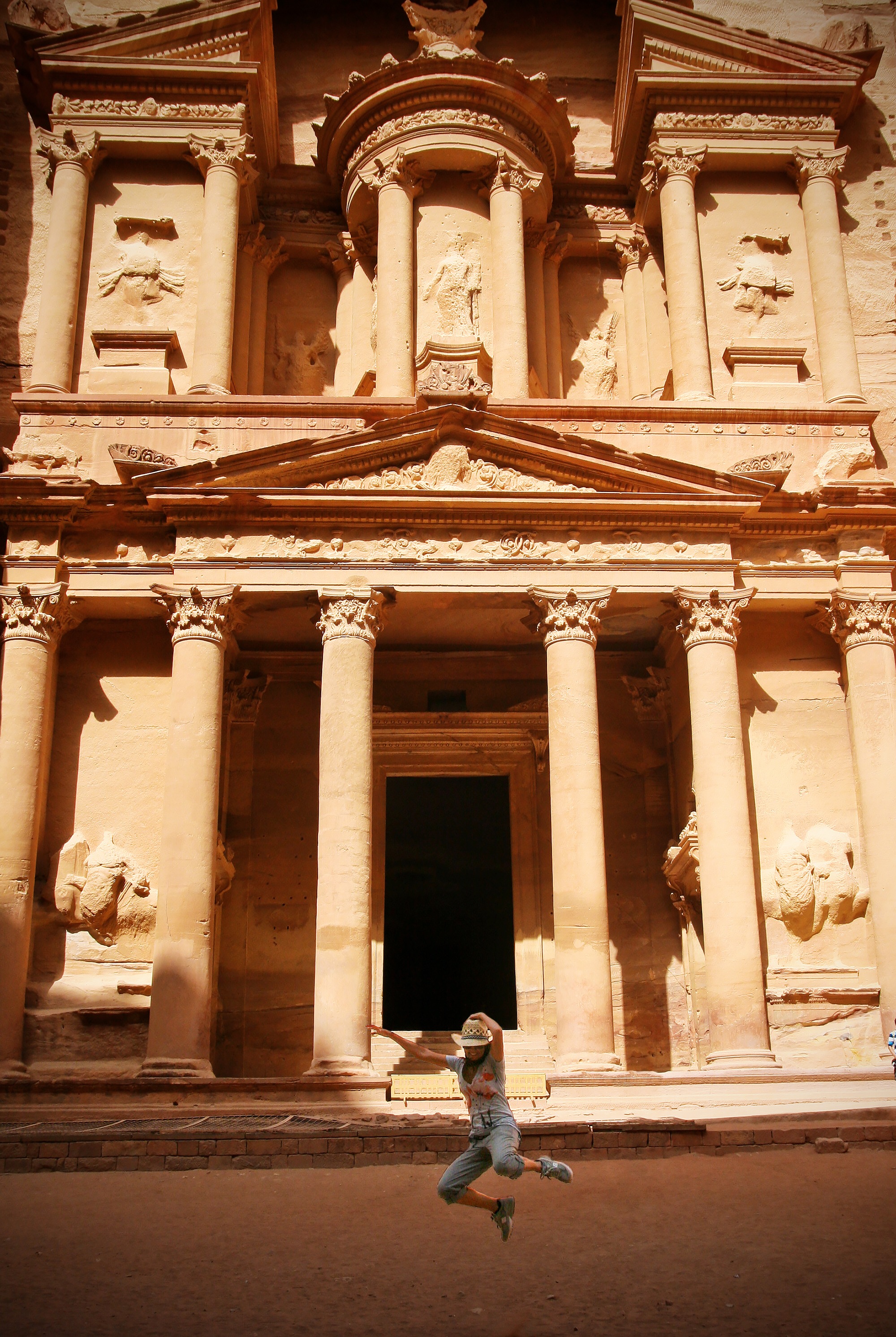 Indiana Jones! An ancient city carved into the mountains.